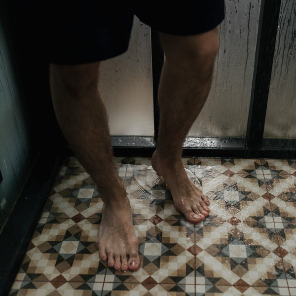 Pies en la ducha
