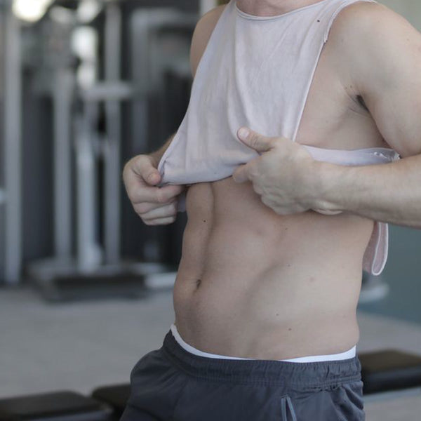 Cintura y torso con ropa deportiva